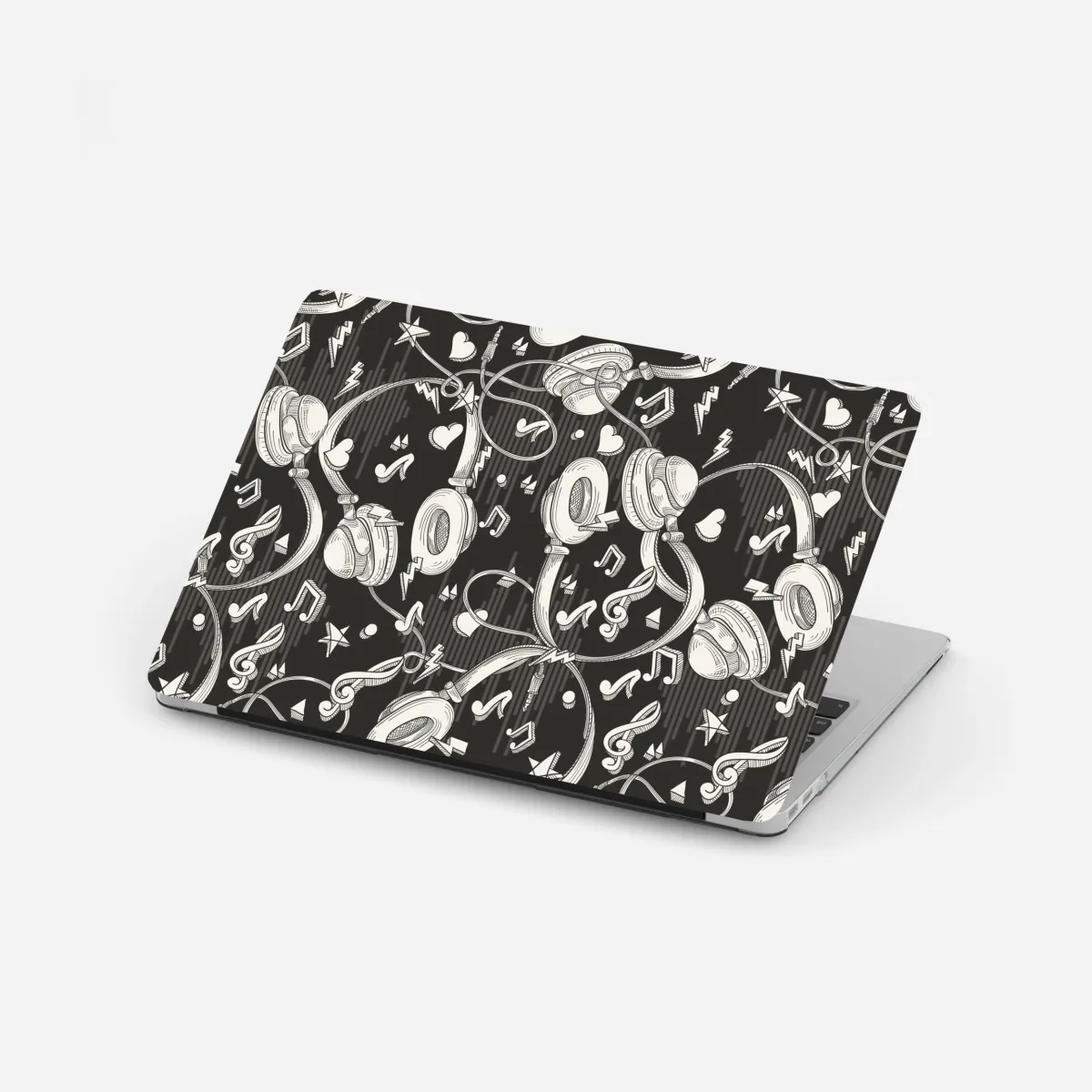 Naklejka na laptopa monochromatyczny wzór słuchawek i nut – Wallissimo® Naklejka na laptopa monochromatyczny wzór słuchawek i nut – Wallissimo®