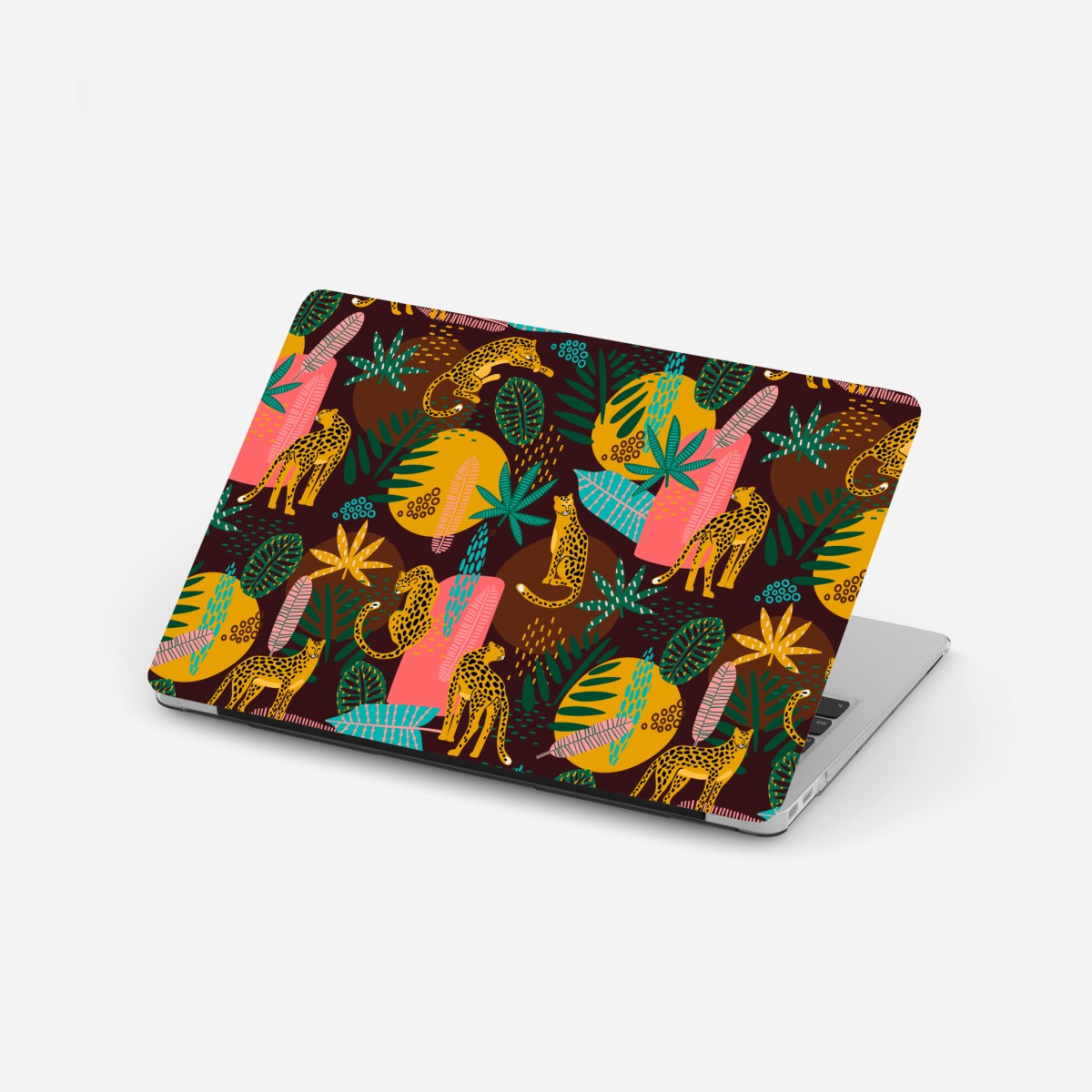 Laptop sticker tropical cheetah pattern with vibrant leaves