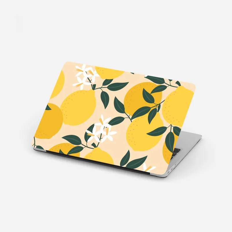 Naklejka na laptopa jasny wzór z cytrynami i kwiatami