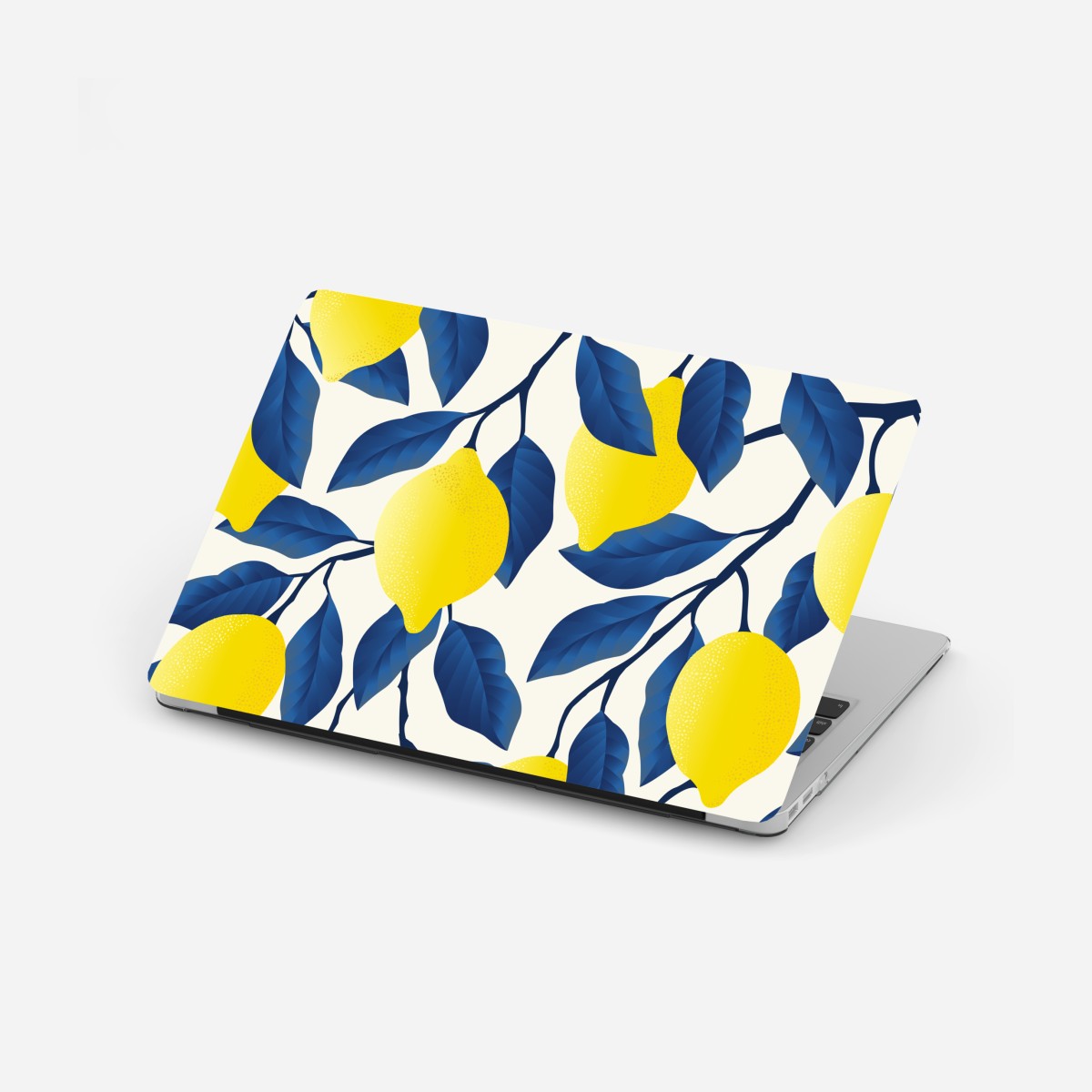 Laptop sticker vibrant lemon pattern with blue leaves