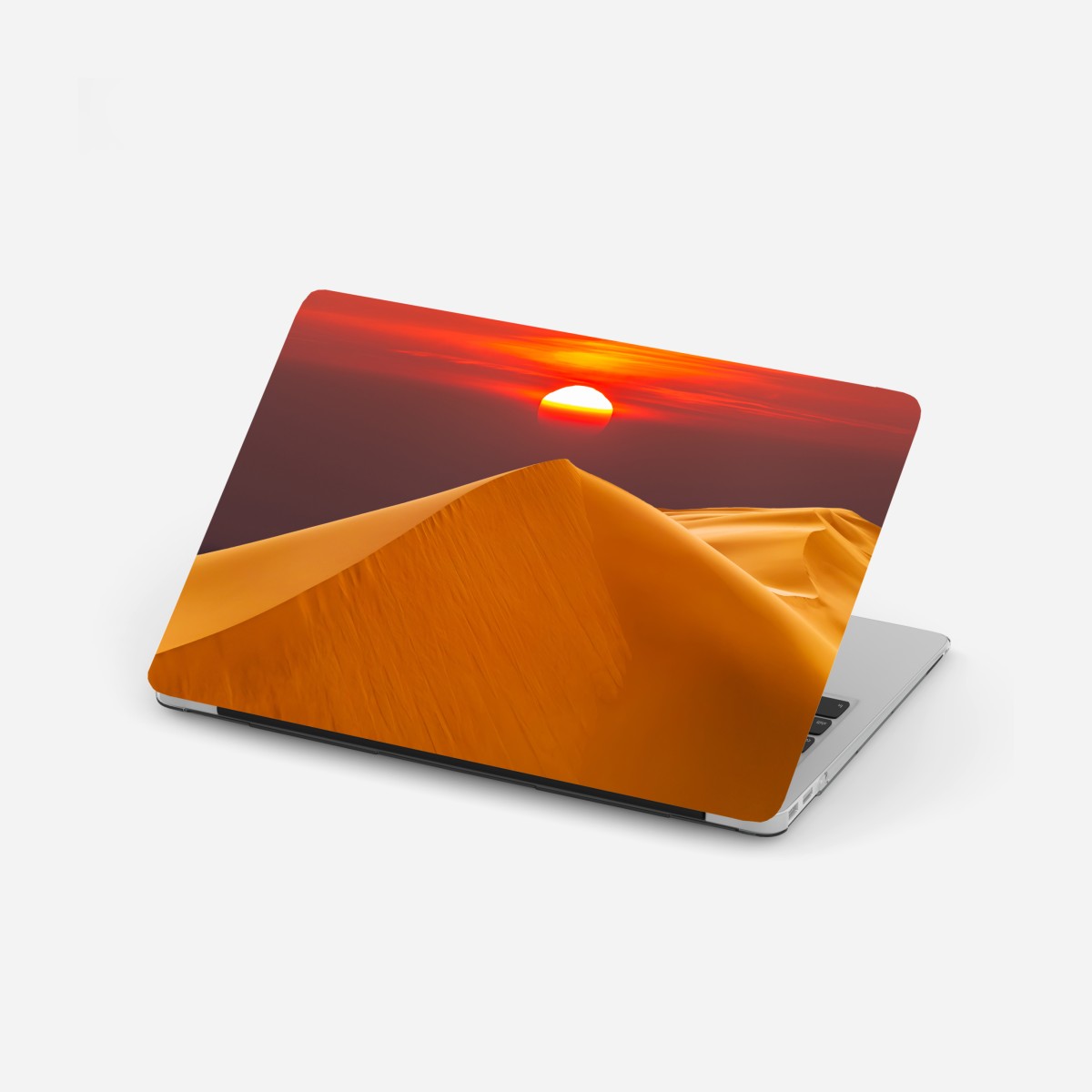 Laptop sticker golden desert sunset over sand dunes