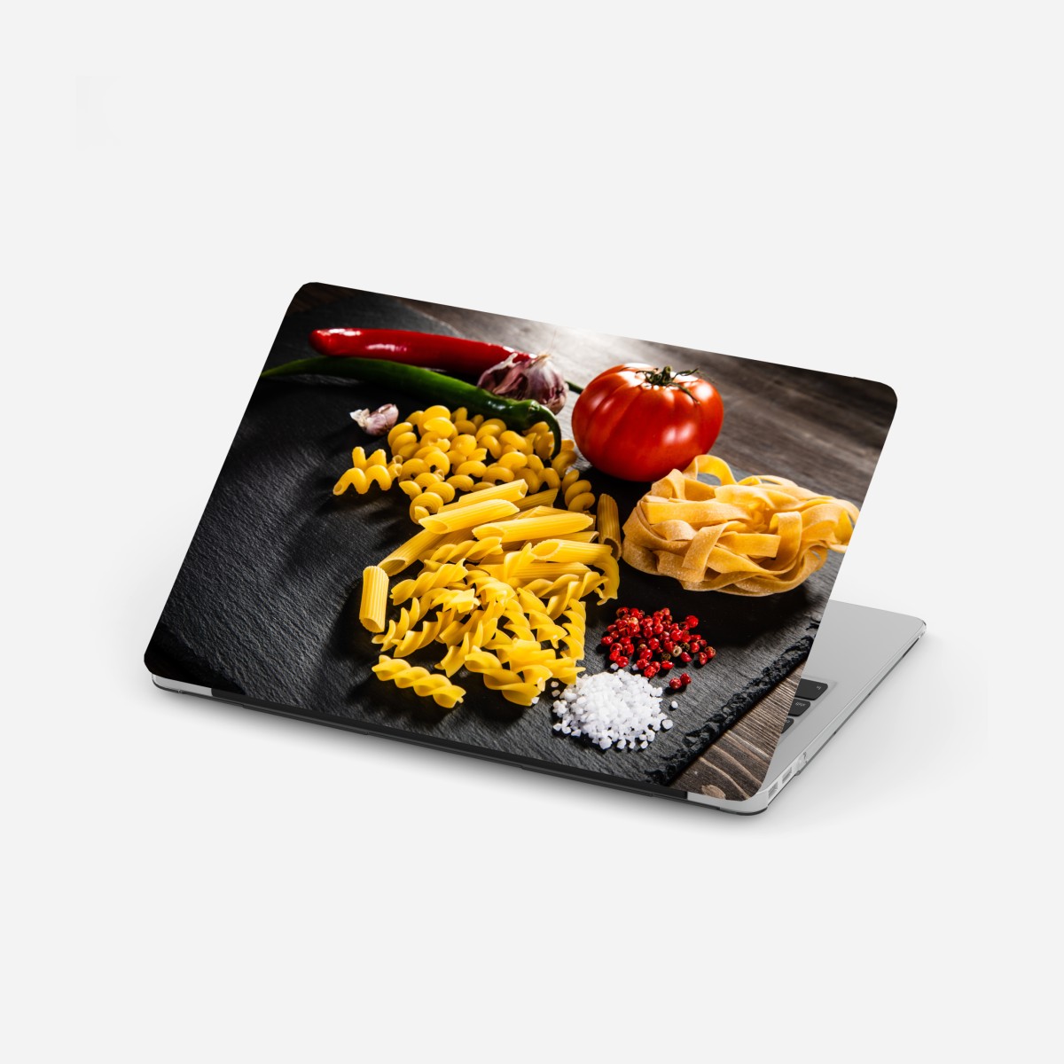 Laptop sticker assorted dry pasta and fresh ingredients