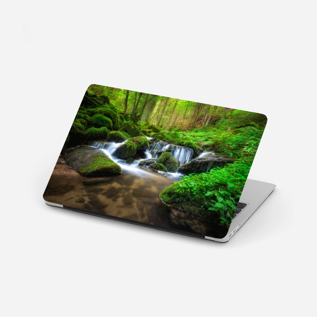 Laptop sticker tranquil mossy forest waterfall