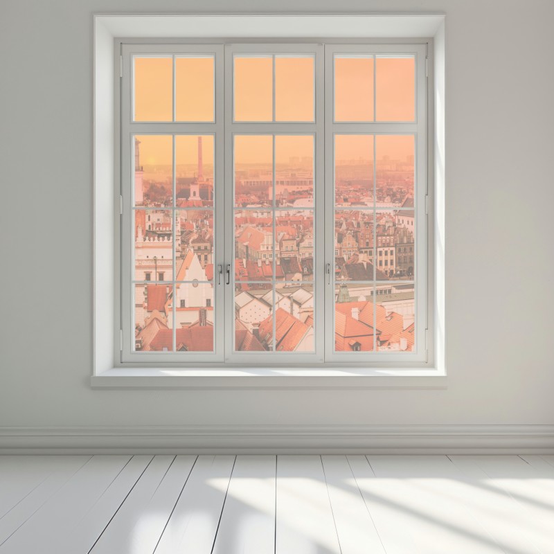 Naklejka na okno ciepły zachód słońca nad zabytkowymi dachami miasta – Wallissimo® Naklejka na okno ciepły zachód słońca nad zabytkowymi dachami miasta – Wallissimo®