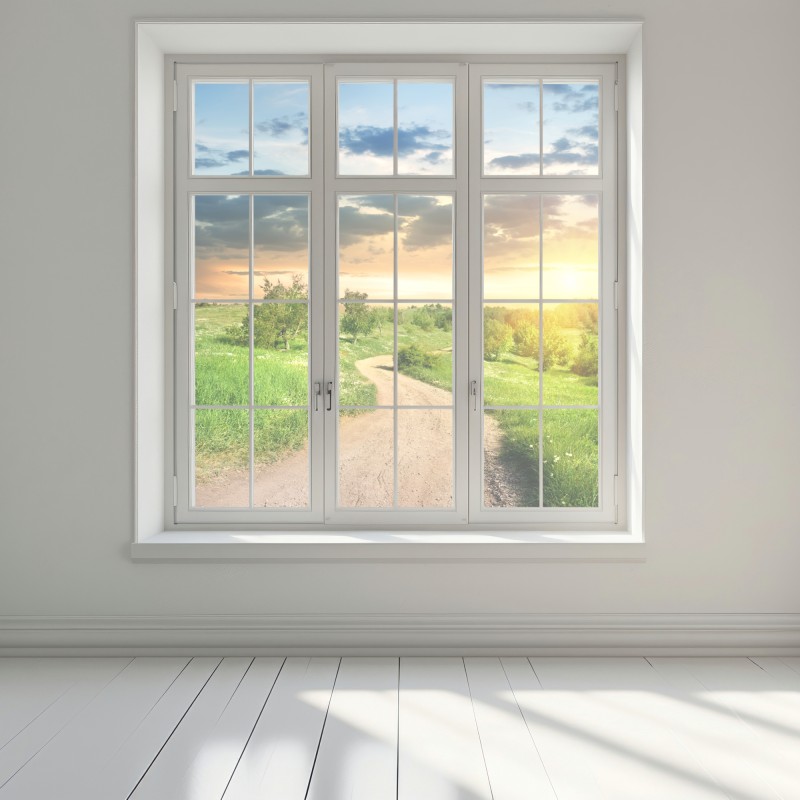 Naklejka na okno zachód słońca nad polną drogą w zielonej łące – Wallissimo® Naklejka na okno zachód słońca nad polną drogą w zielonej łące – Wallissimo®