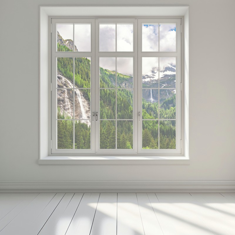Naklejka na okno mglisty alpejski wodospad nad zieloną doliną – Wallissimo® Naklejka na okno mglisty alpejski wodospad nad zieloną doliną – Wallissimo®