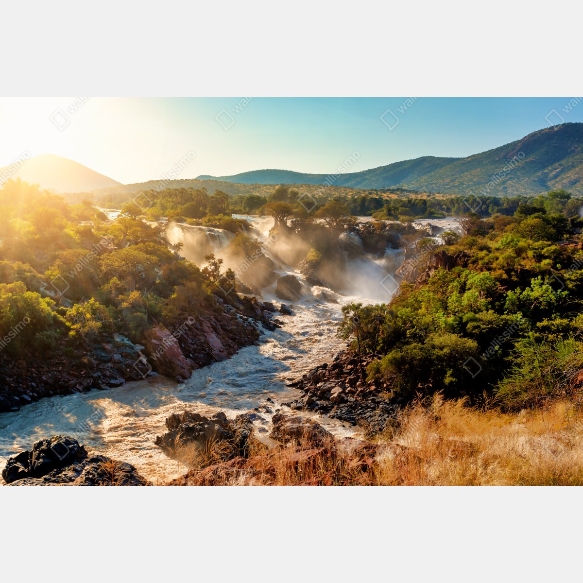 Naklejka na okno wschód słońca nad Wodospadami Epupa – Wallissimo® Naklejka na okno wschód słońca nad Wodospadami Epupa – Wallissimo®