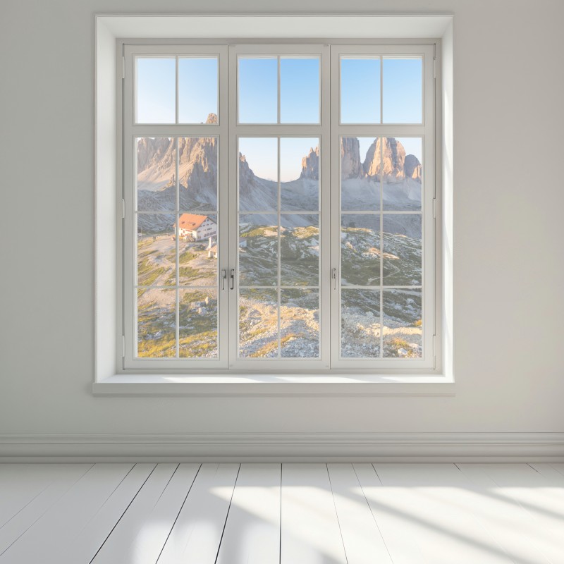 Naklejka na okno oświetlone słońcem schronisko w górach – Wallissimo® Naklejka na okno oświetlone słońcem schronisko w górach – Wallissimo®
