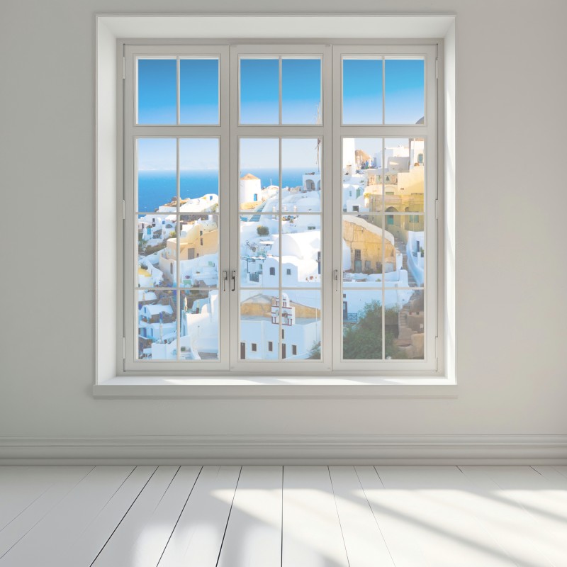 Naklejka na okno nasłonecznione miasteczko Santorini nad morzem – Wallissimo® Naklejka na okno nasłonecznione miasteczko Santorini nad morzem – Wallissimo®