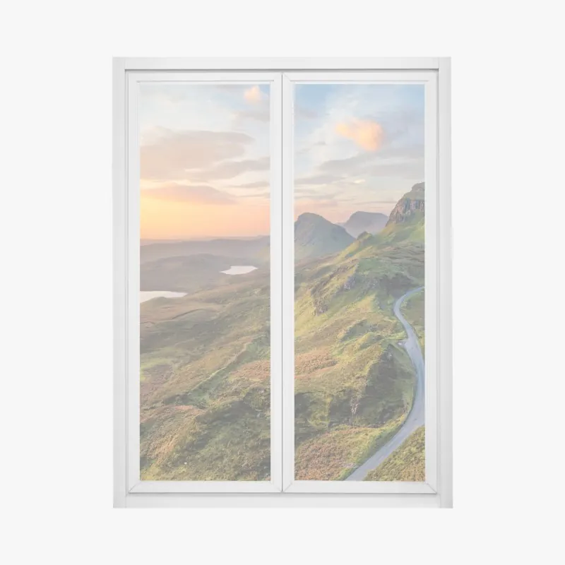 Naklejka na okno zachód słońca nad zielonymi wzgórzami