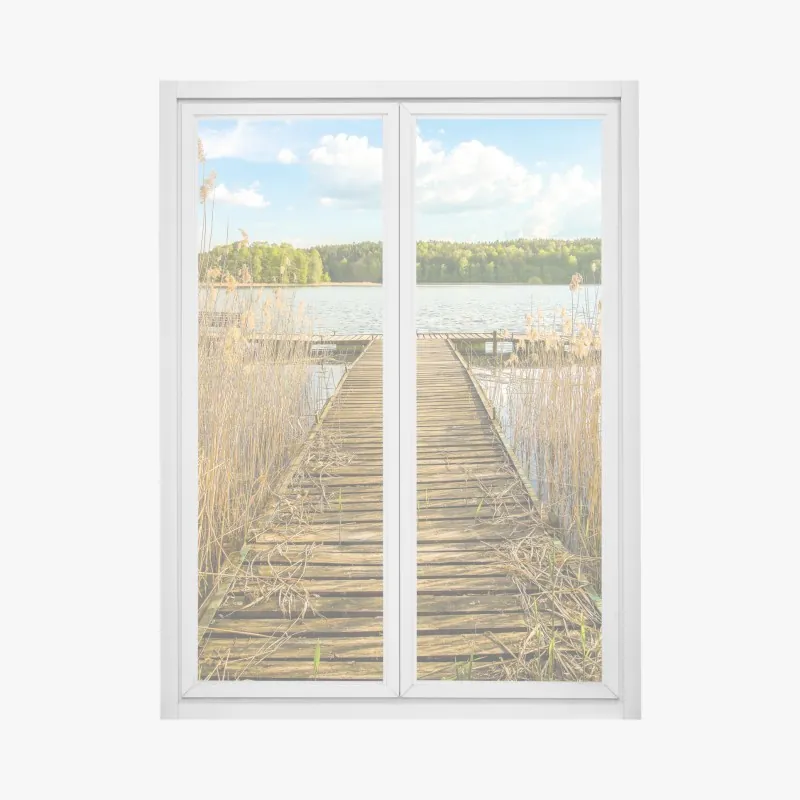 Naklejka na okno drewniany pomost nad spokojnym jeziorem