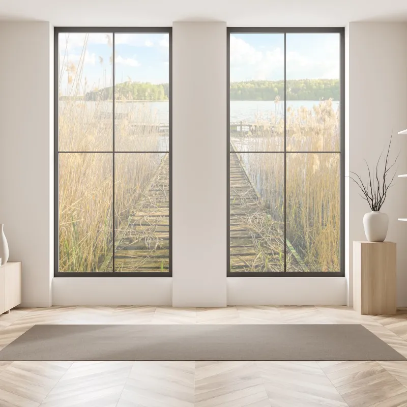 Naklejka na okno słoneczna łąka z mniszkami i błękitnym niebem – Wallissimo®