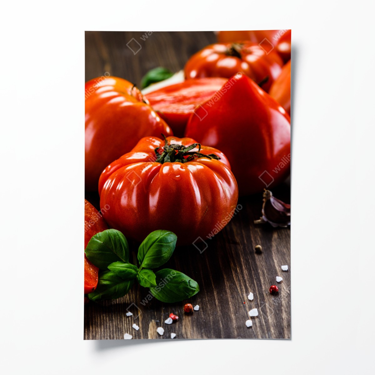 Poster ripe heirloom tomatoes on a rustic wooden table