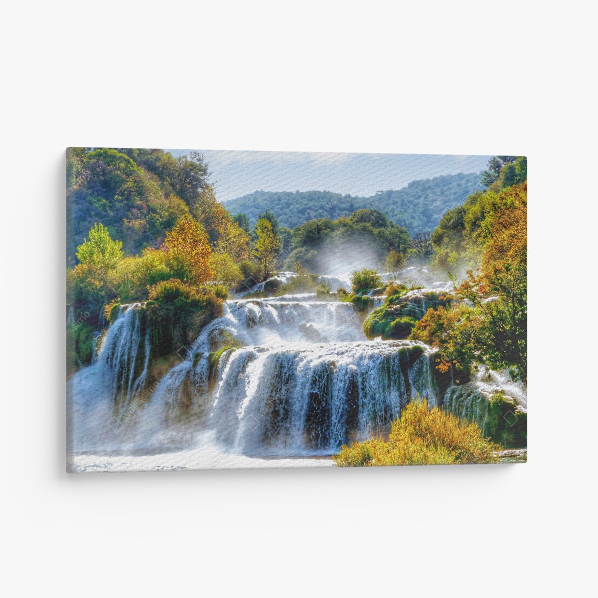 Canvas print cascading waterfall in lush forest
