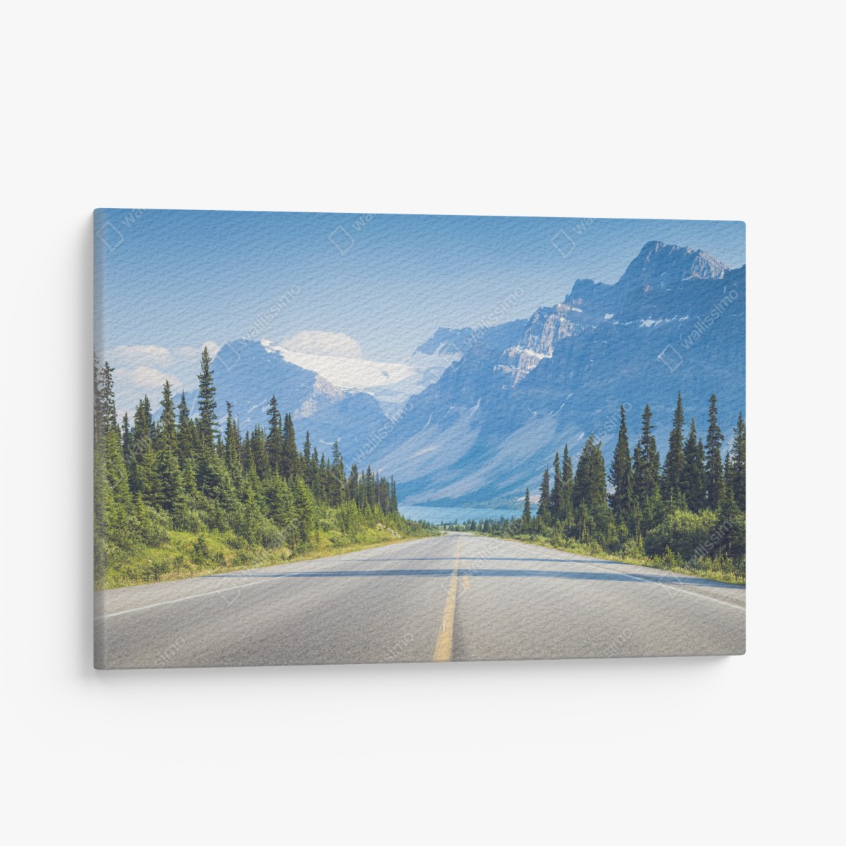 Canvas print road through pine forest to a glacier-fed mountain lake