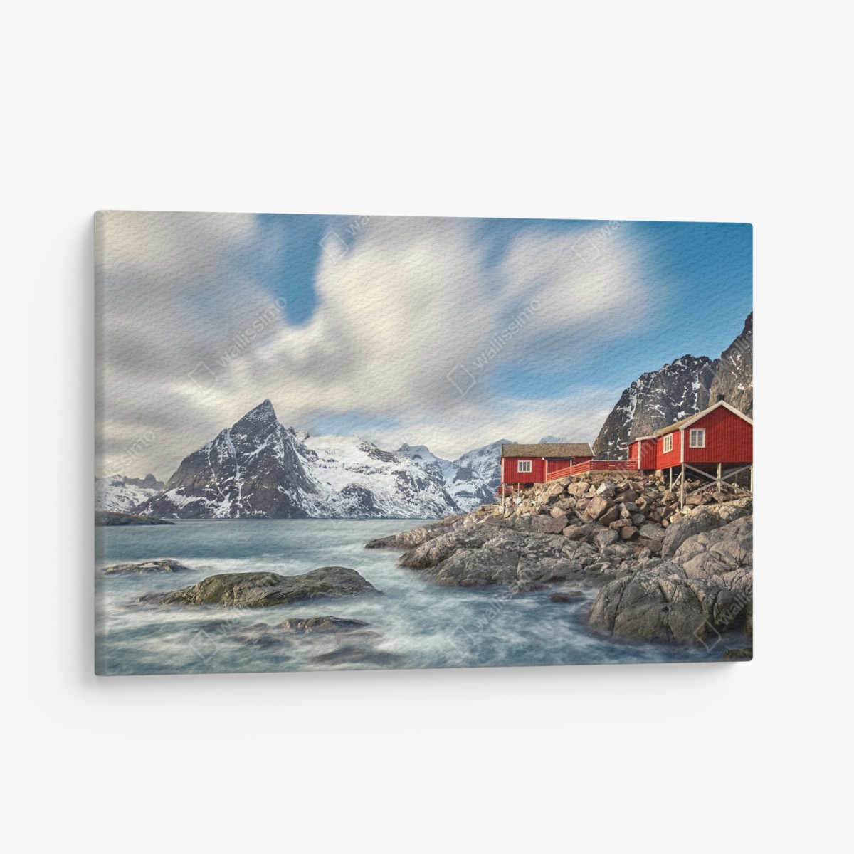 Canvas print red cabins by snowy coastal mountains
