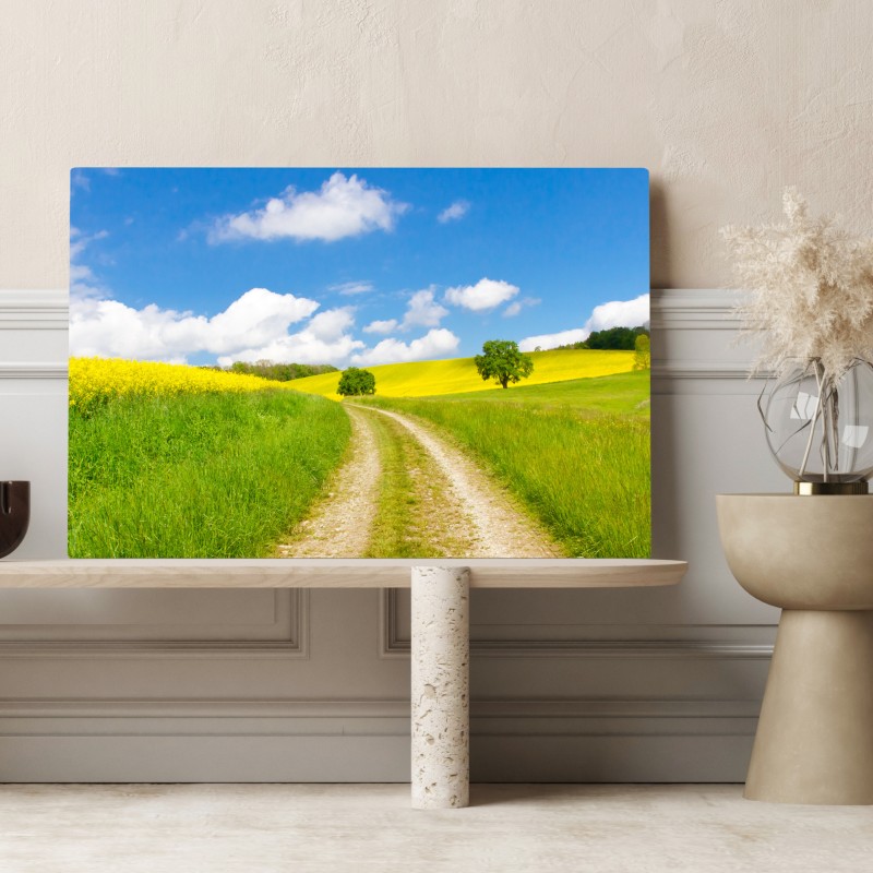 Obraz na płótnie słoneczna wiejska droga przez żółte pola – Wallissimo® Obraz na płótnie słoneczna wiejska droga przez żółte pola – Wallissimo®