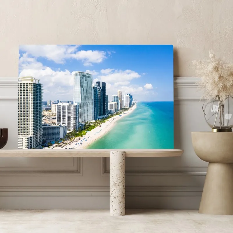 Obraz na płótnie turkusowa linia brzegowa z wieżowcami – Wallissimo® Obraz na płótnie turkusowa linia brzegowa z wieżowcami – Wallissimo®