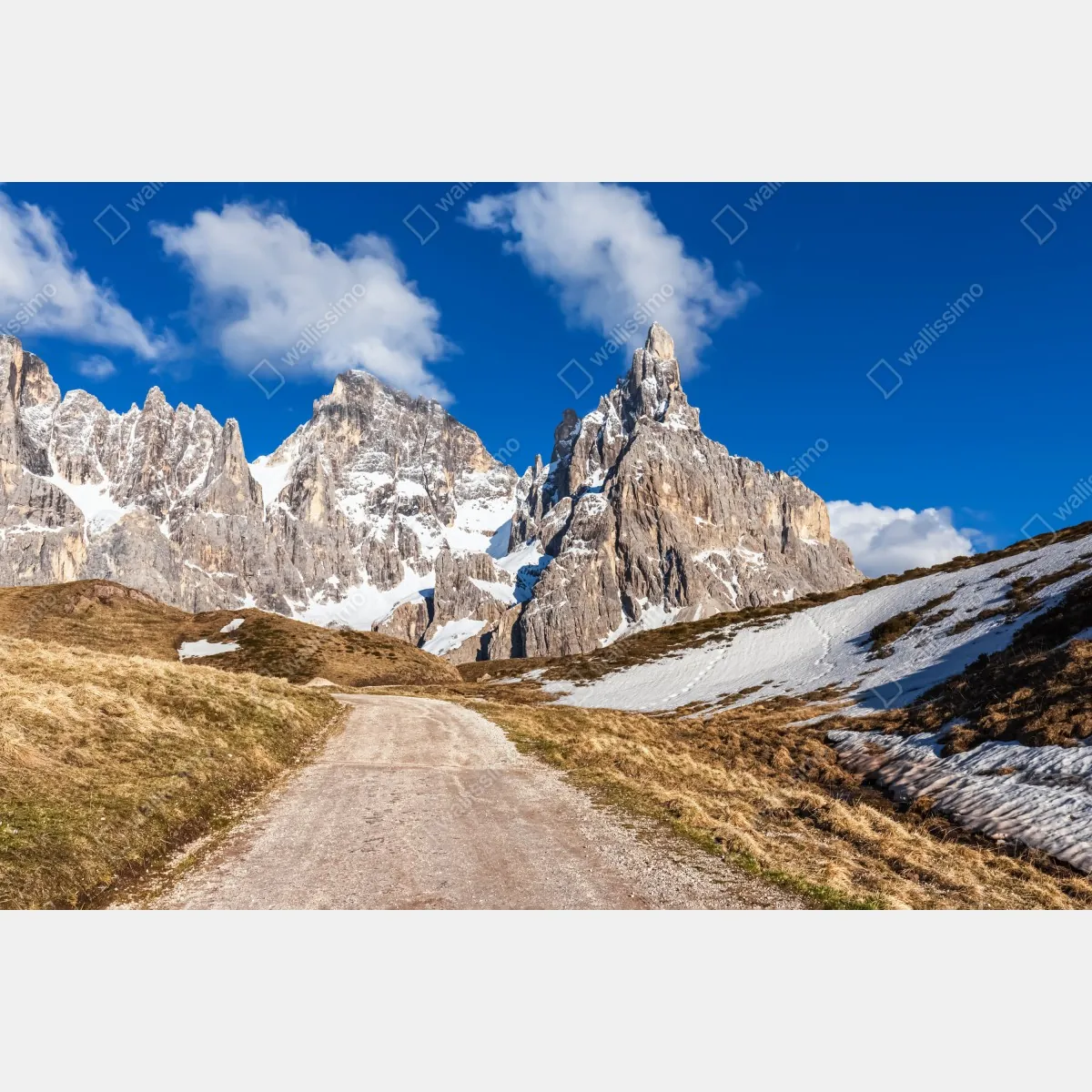 Obraz na płótnie strzeliste szczyty górskie i wijąca się ścieżka – Wallissimo® Obraz na płótnie strzeliste szczyty górskie i wijąca się ścieżka – Wallissimo®