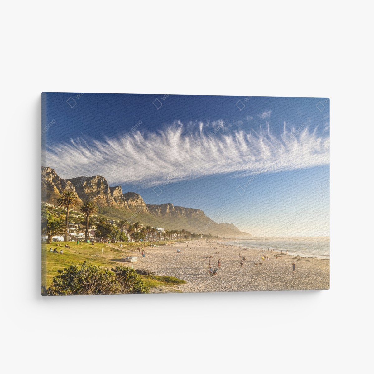 Canvas print sunlit beach with mountain backdrop