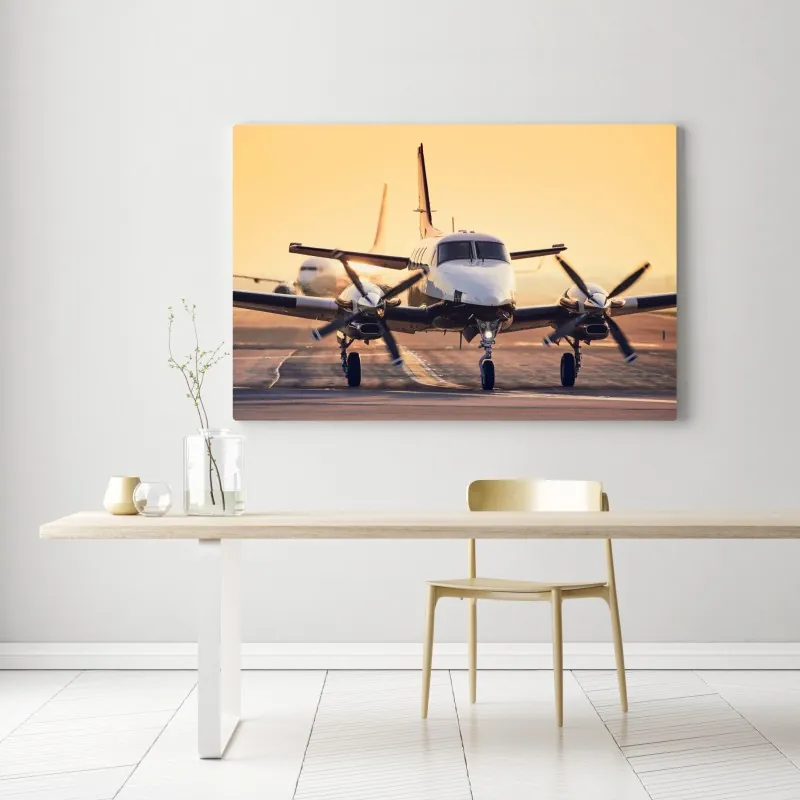 Obraz na płótnie dwusilnikowy turboprop na złotym pasie startowym – Wallissimo® Obraz na płótnie dwusilnikowy turboprop na złotym pasie startowym – Wallissimo®