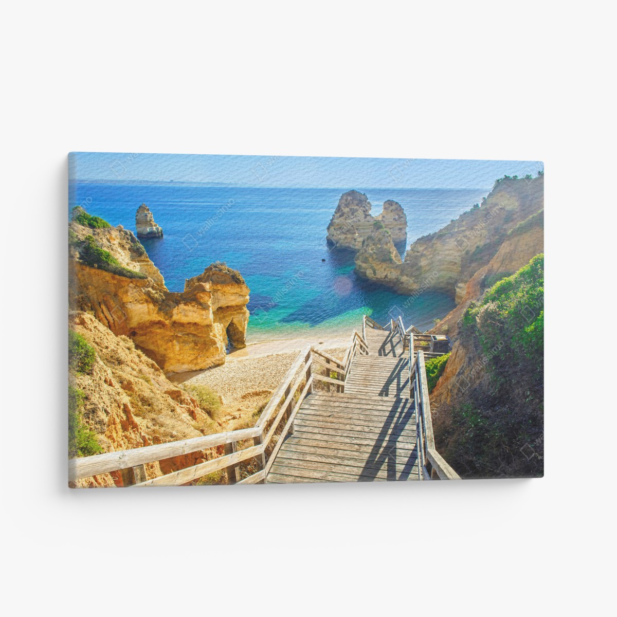 Canvas print sunlit coastal steps to a turquoise cove