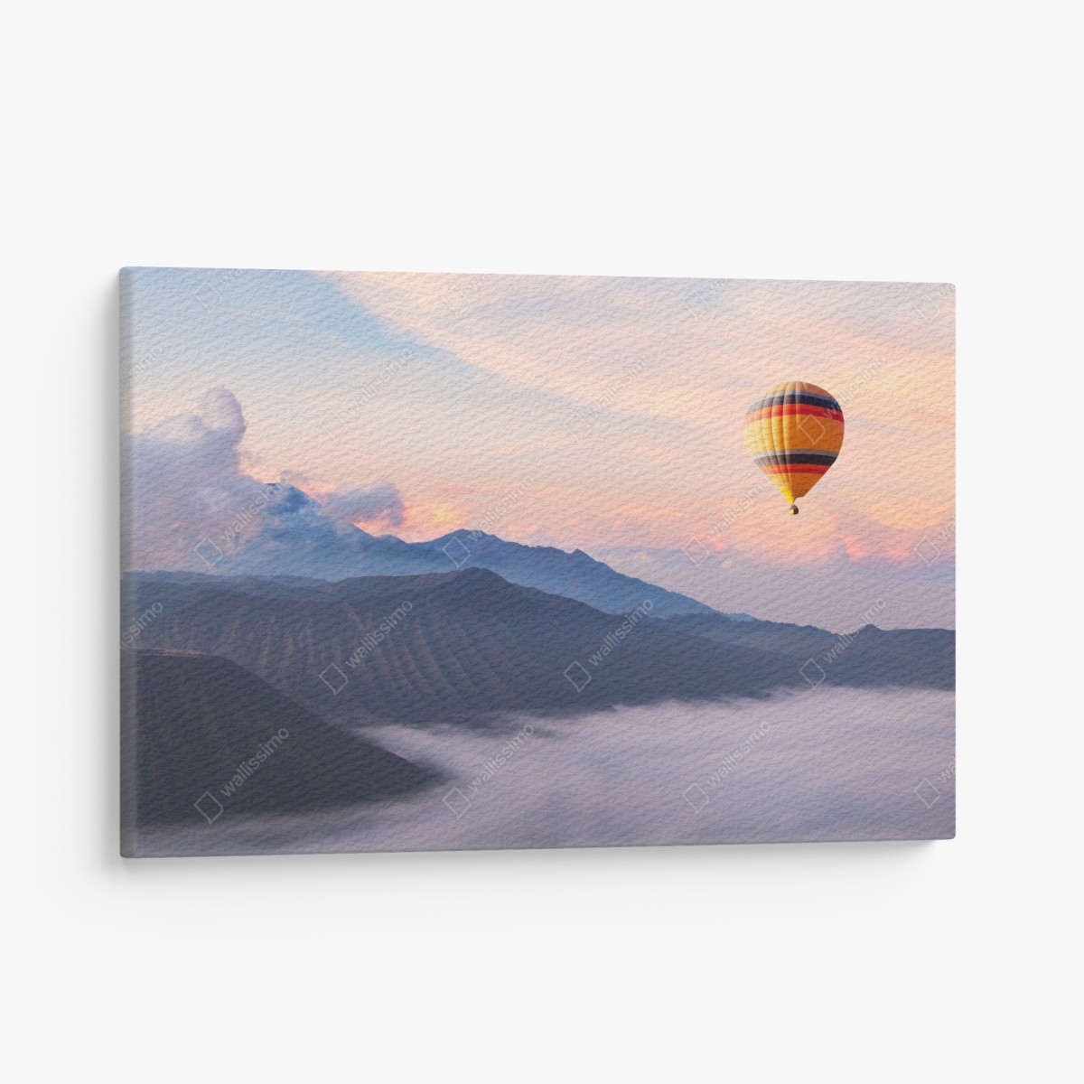 Canvas print hot air balloon over misty mountains