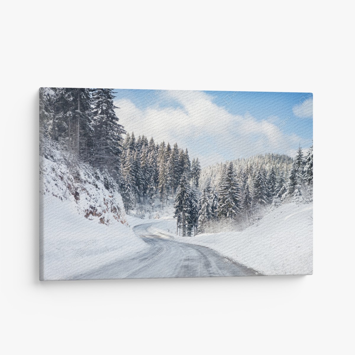 Canvas print winter road through snowy fir forest