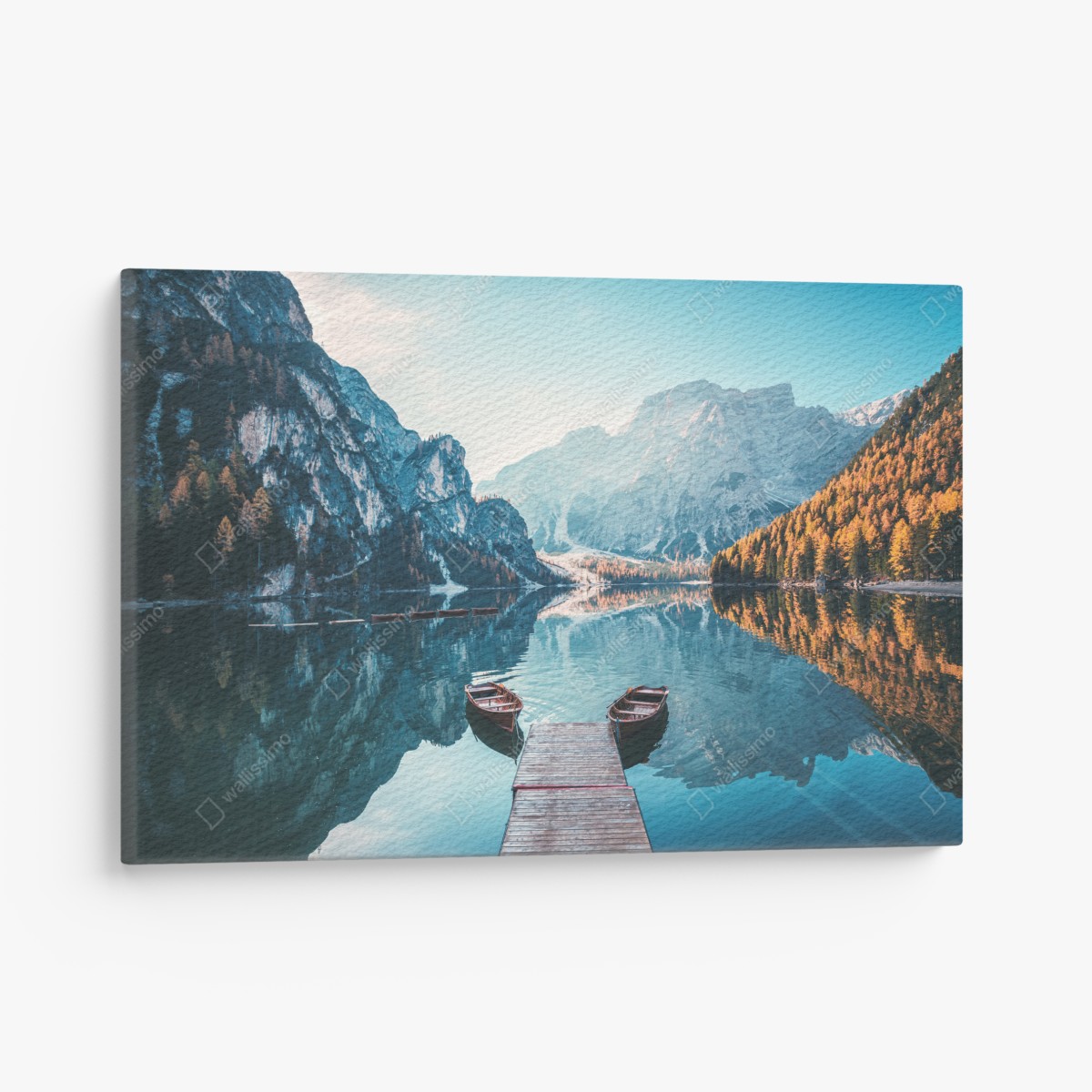 Canvas print sunlit dock at Braies Lake, Dolomites