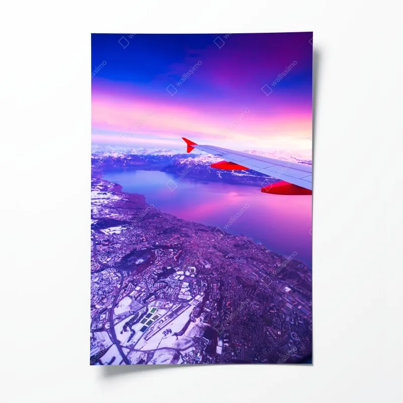 Plakat panorama miasta nad jeziorem z lotu ptaka o zachodzie