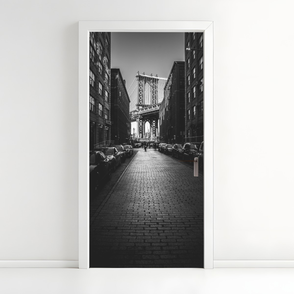 Door sticker Manhattan bridge framed by cobblestone street – Wallissimo®