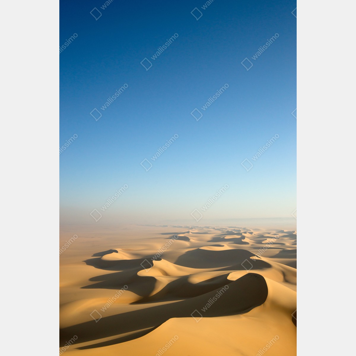 Naklejka na lodówkę niekończące się wydmy pustyni pod błękitnym niebem – Wallissimo® Naklejka na lodówkę niekończące się wydmy pustyni pod błękitnym niebem – Wallissimo®