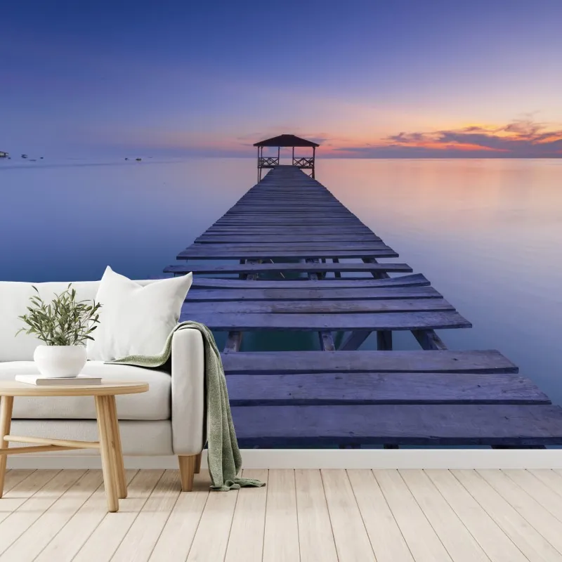 Fototapeta spokojne drewniane molo o zachodzie słońca