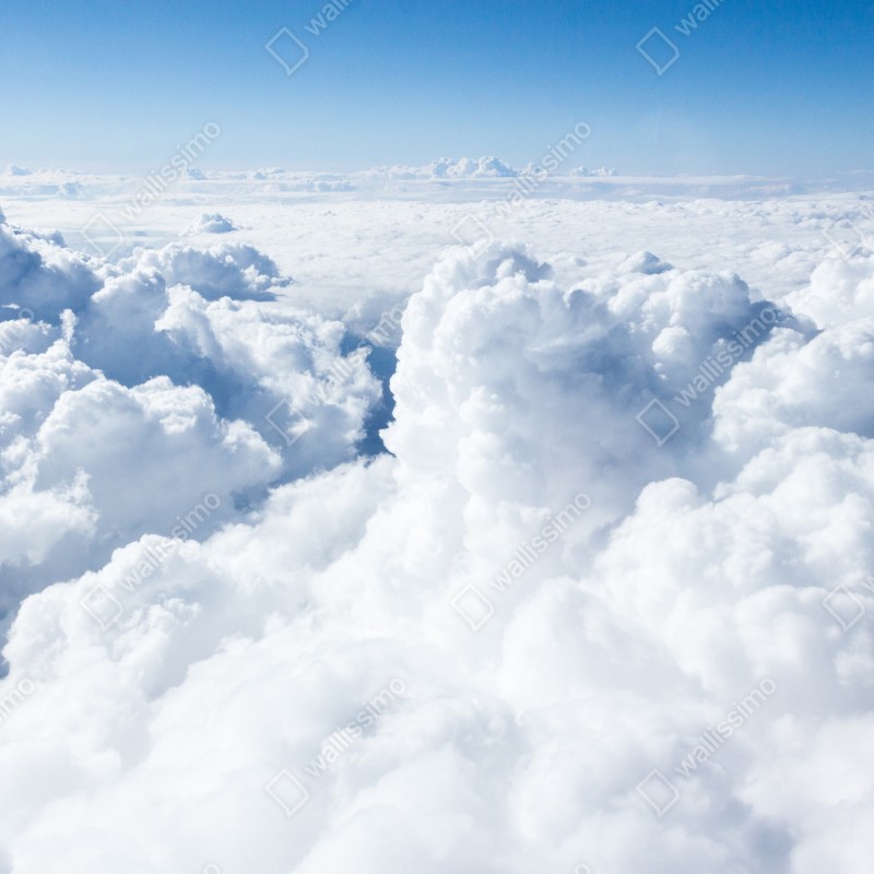 Fototapeta widok z lotu ptaka: miękkie chmury i błękitne niebo – Wallissimo® Fototapeta widok z lotu ptaka: miękkie chmury i błękitne niebo – Wallissimo®