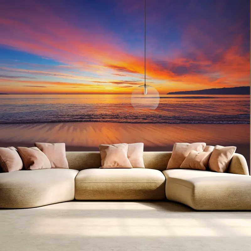 Fototapeta żywy wschód słońca nad spokojną plażą