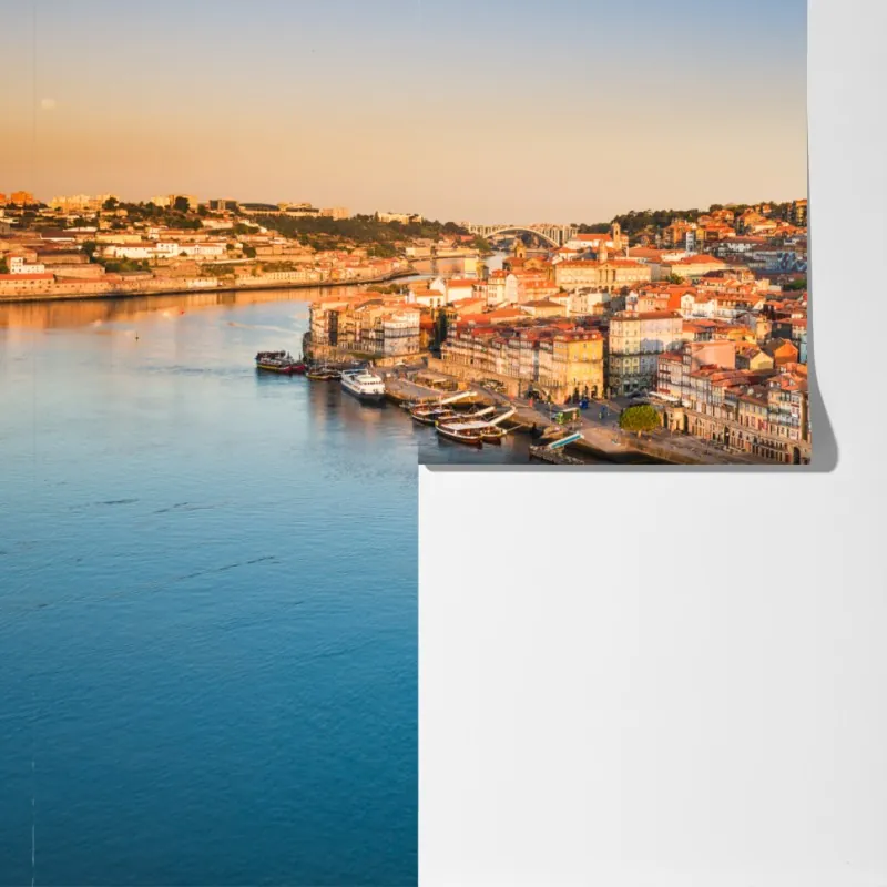 Fototapeta słoneczna panorama nabrzeża Porto o zachodzie słońca – Wallissimo® Fototapeta słoneczna panorama nabrzeża Porto o zachodzie słońca – Wallissimo®
