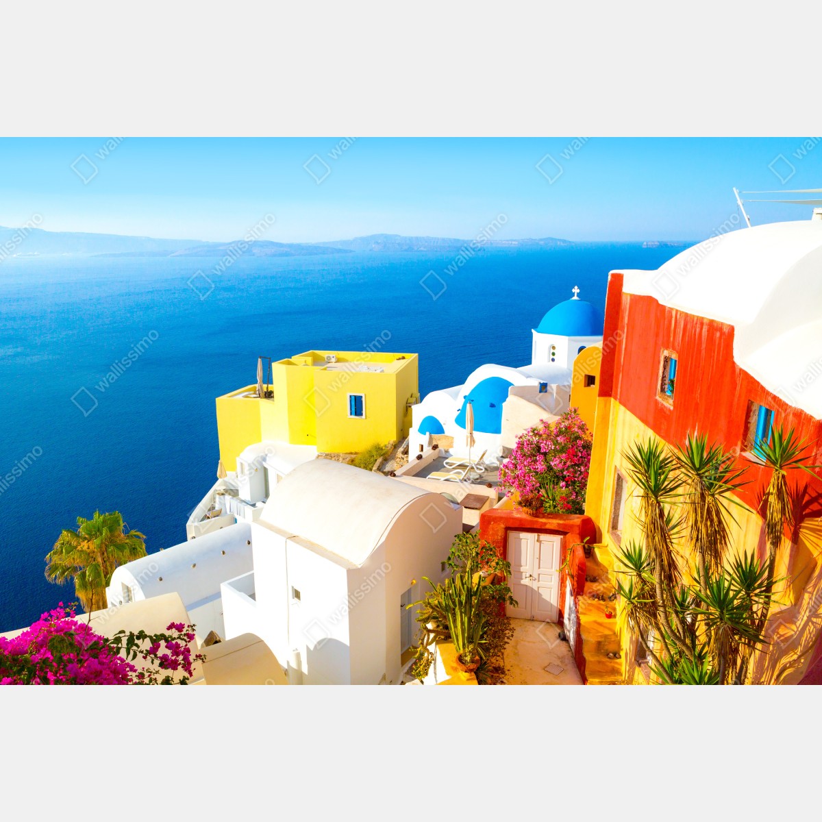 Fototapeta słoneczna Santorini nadmorska wioska – Wallissimo® Fototapeta słoneczna Santorini nadmorska wioska – Wallissimo®