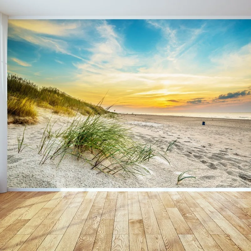 Fototapeta zachód słońca nad spokojnymi wydmami