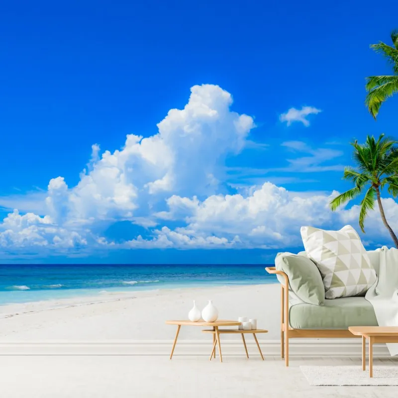 Fototapeta tropikalna plaża z palmami pod błękitnym niebem