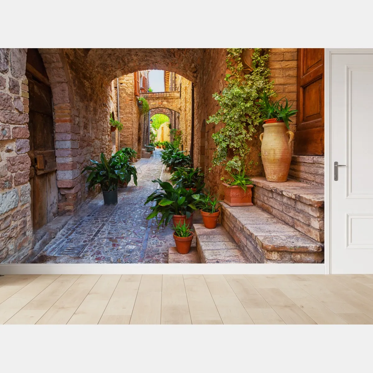Fototapeta słoneczna uliczka z doniczkami w Spello – Wallissimo® Fototapeta słoneczna uliczka z doniczkami w Spello – Wallissimo®