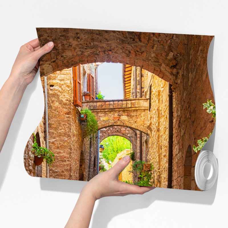 Fototapeta słoneczna uliczka z doniczkami w Spello – Wallissimo® Fototapeta słoneczna uliczka z doniczkami w Spello – Wallissimo®