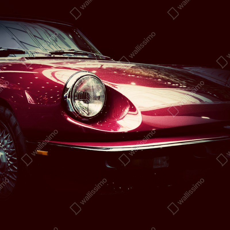 Fototapeta zbliżenie klasycznego czerwonego samochodu sportowego – Wallissimo® Fototapeta zbliżenie klasycznego czerwonego samochodu sportowego – Wallissimo®