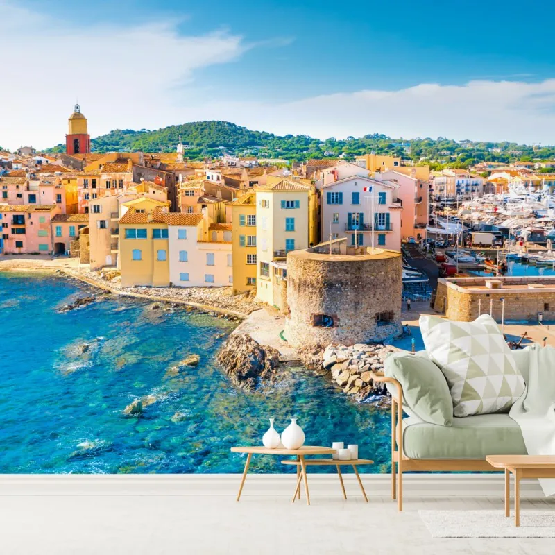 Wall mural sunlit Mediterranean harbor cityscape