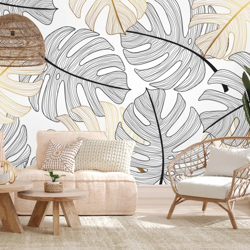 Wall mural monstera leaf pattern with gold accents