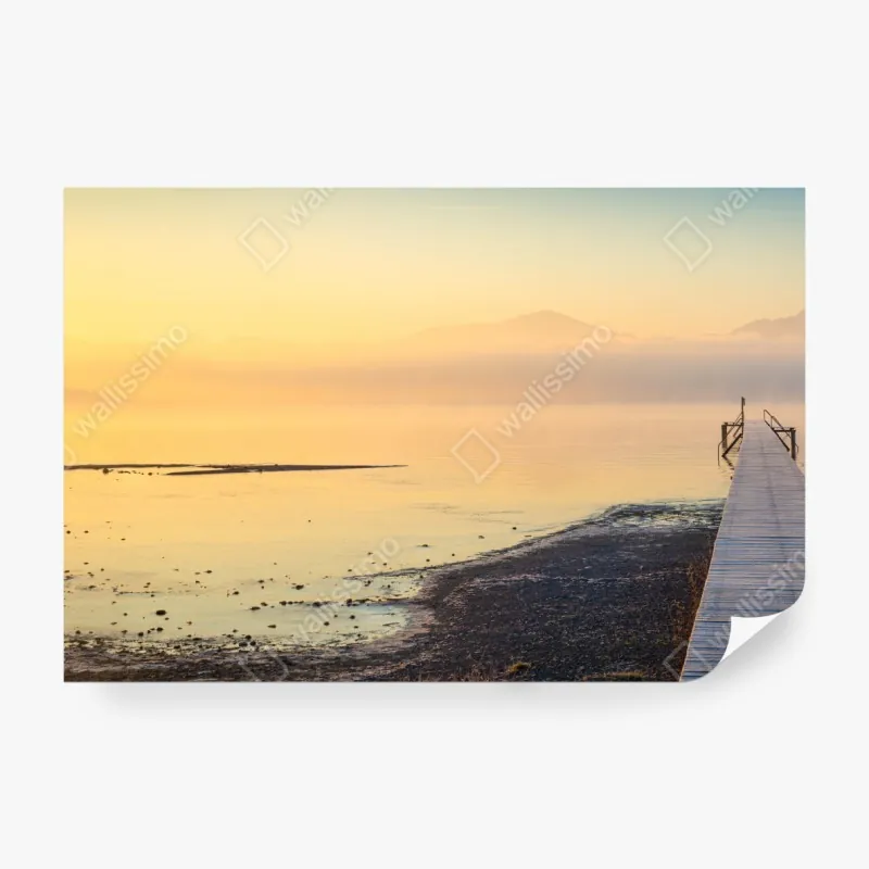 Wall mural misty sunrise over wooden pier