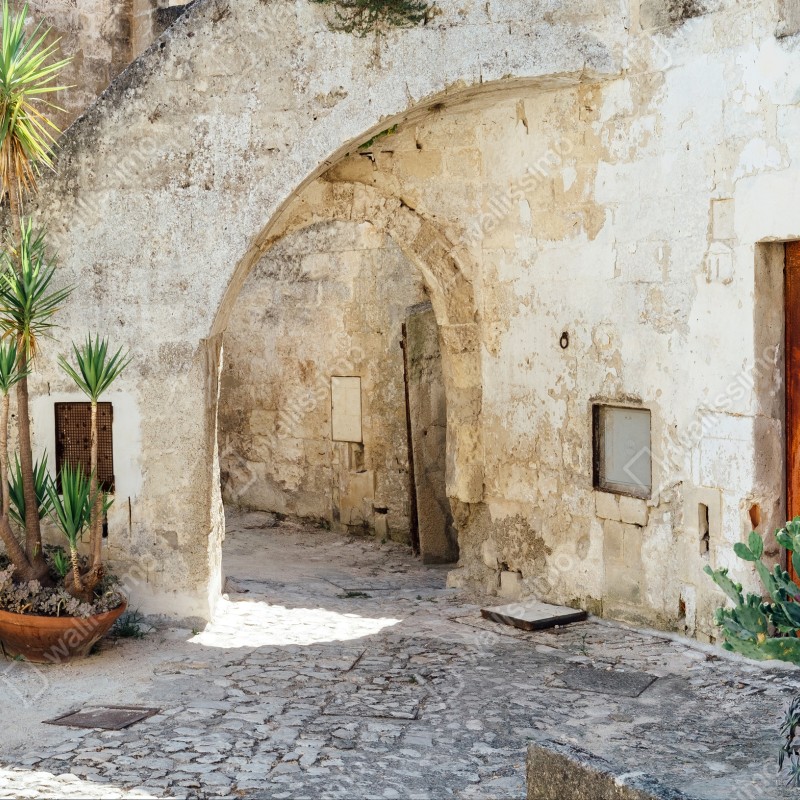 Fototapeta śródziemnomorski kamienny dziedziniec z łukiem – Wallissimo® Fototapeta śródziemnomorski kamienny dziedziniec z łukiem – Wallissimo®