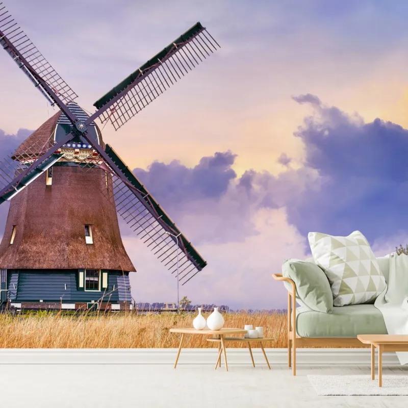 Wall mural historic windmill in golden fields