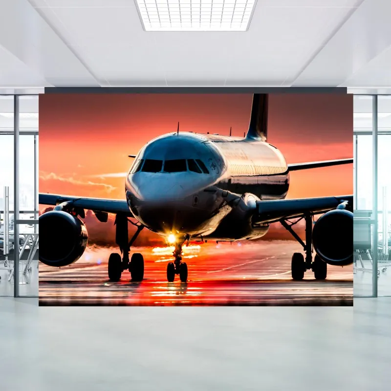 Wall mural sunset jet on runway