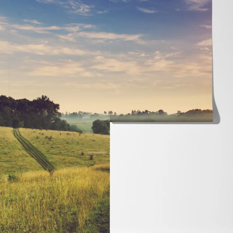 Fototapeta mglisty wschód słońca nad wiejską łąką – Wallissimo® Fototapeta mglisty wschód słońca nad wiejską łąką – Wallissimo®