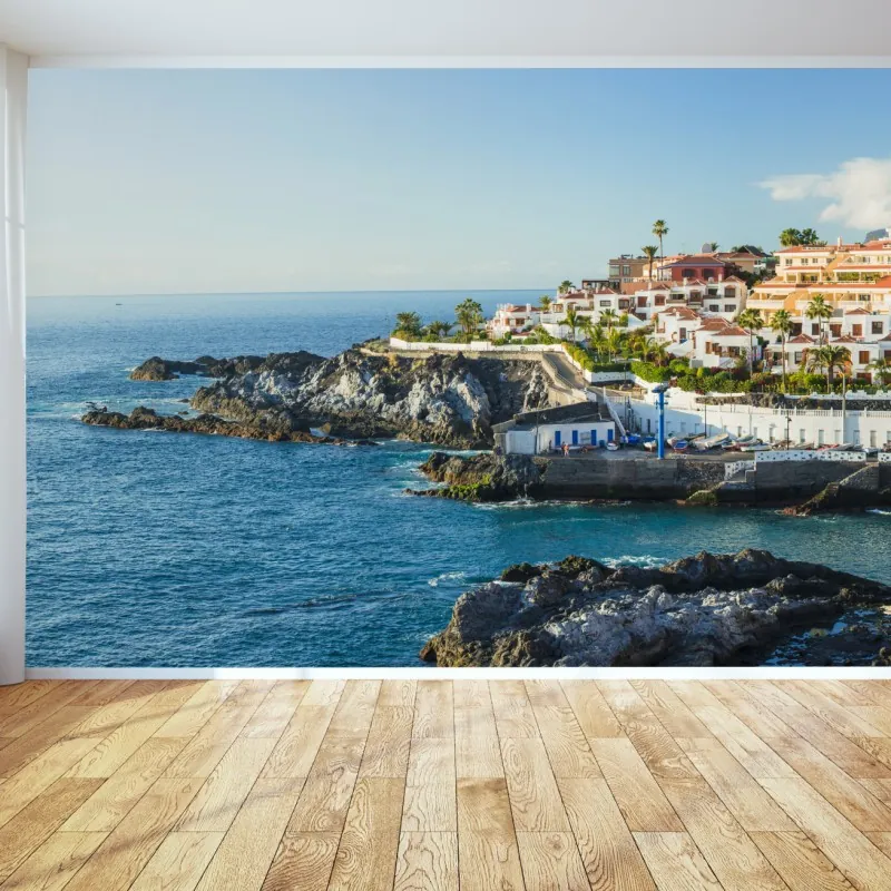 Wall mural sunlit coastal village panorama